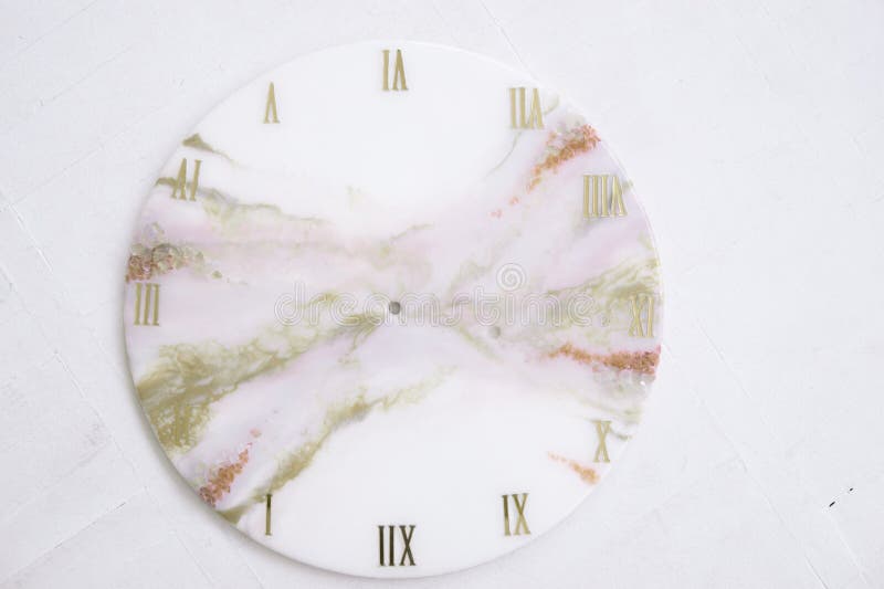 Handmade interior clocks made of epoxy resin. An interior item. Handmade interior clocks made of epoxy resin. An interior item