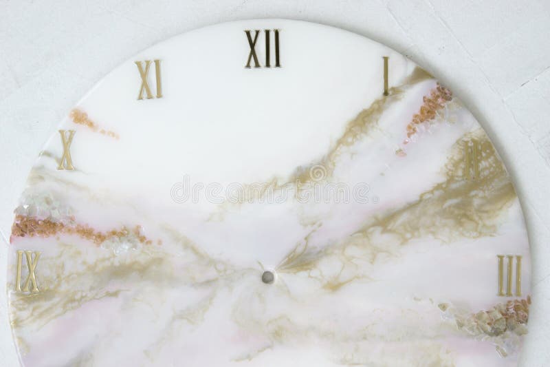 Handmade interior clocks made of epoxy resin. An interior item. Handmade interior clocks made of epoxy resin. An interior item