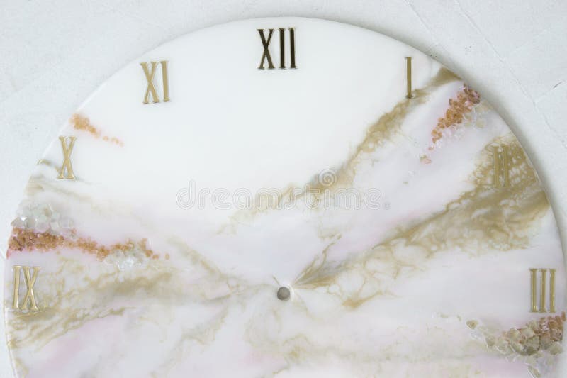 Handmade interior clocks made of epoxy resin. An interior item. Handmade interior clocks made of epoxy resin. An interior item