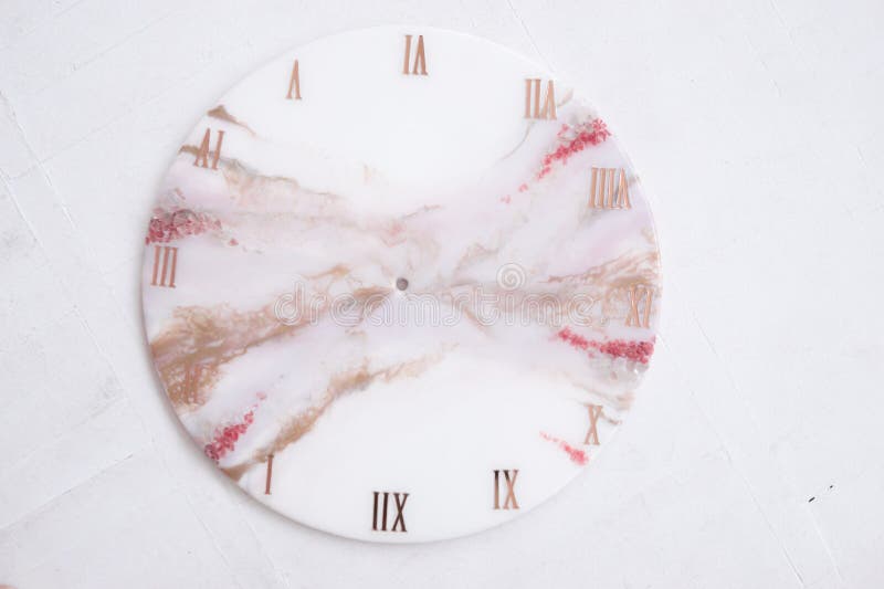 Handmade interior clocks made of epoxy resin. An interior item. Handmade interior clocks made of epoxy resin. An interior item