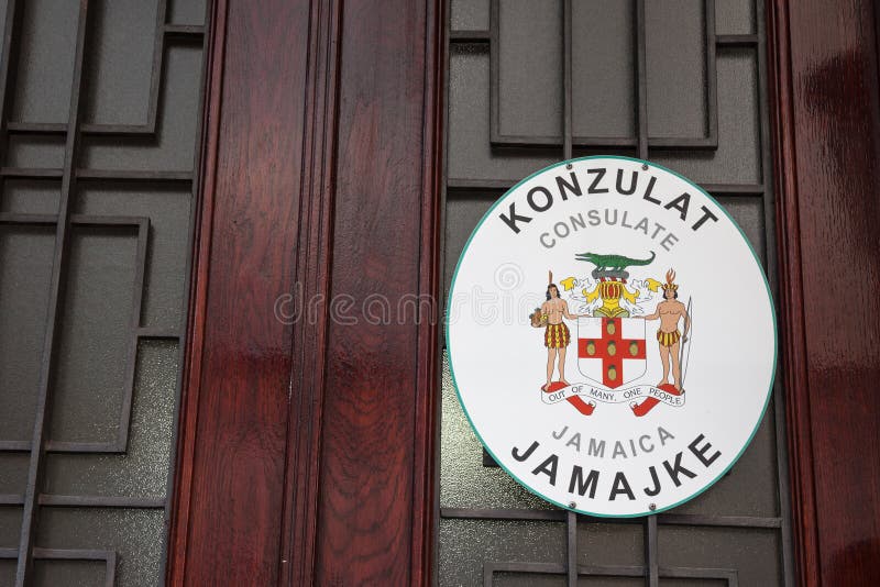 BELGRADE, SERBIA - JULY 10, 2018:  It is the official diplomatic representation of the Commonwealth of Jamaica in Serbia...Picture of the coat of arms of Jamaica in front of their embassy in downtown Belgrade, Serbia. It is the consulate and the official representation of the foreign affairs of the Commonwealth of Jamaica. BELGRADE, SERBIA - JULY 10, 2018:  It is the official diplomatic representation of the Commonwealth of Jamaica in Serbia...Picture of the coat of arms of Jamaica in front of their embassy in downtown Belgrade, Serbia. It is the consulate and the official representation of the foreign affairs of the Commonwealth of Jamaica