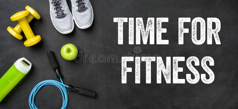 Fitness equipment on a dark background - Time for Fitness. Fitness equipment on a dark background - Time for Fitness