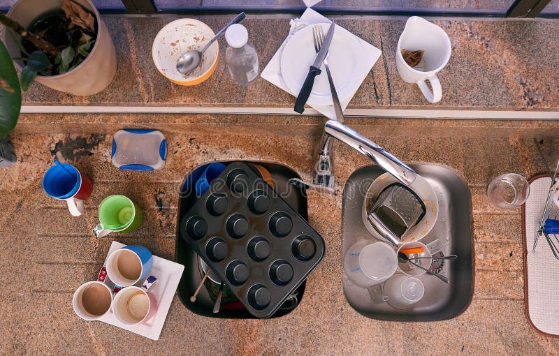 Time to do some dishes. a kitchen sink surrounded by dishes. Time to do some dishes. a kitchen sink surrounded by dishes