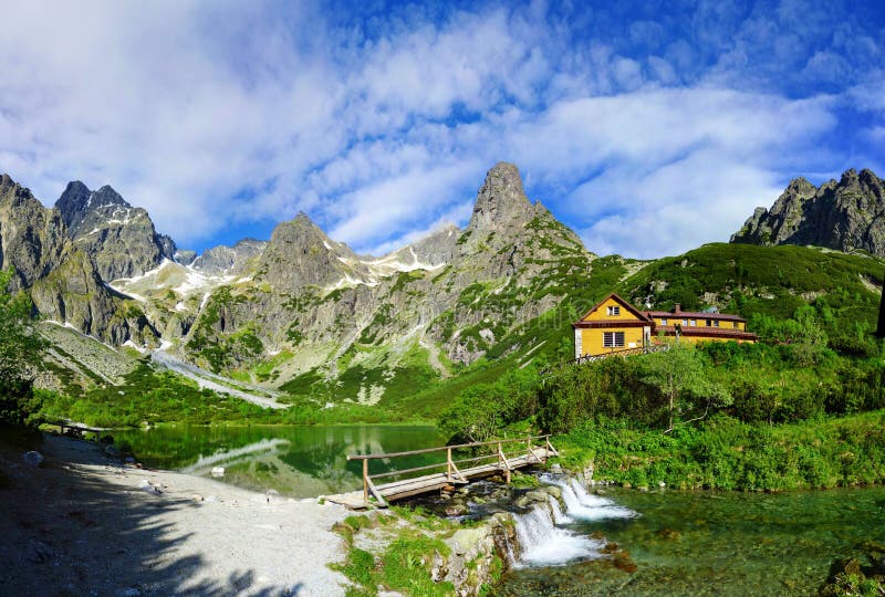 Zelene pleso lake in Tatra mountains with beautiful bridge over waterfall - idyllic summer