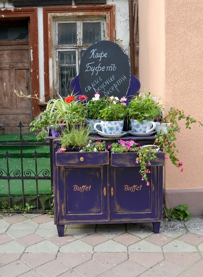 ZELENOGRADSK, RUSSIA - JANUARY 11, 2017: Advertizing installation of Bufet cafe on Kurortny Avenue. Russian text of `Cafe of Bufet`. ZELENOGRADSK, RUSSIA - JANUARY 11, 2017: Advertizing installation of Bufet cafe on Kurortny Avenue. Russian text of `Cafe of Bufet`