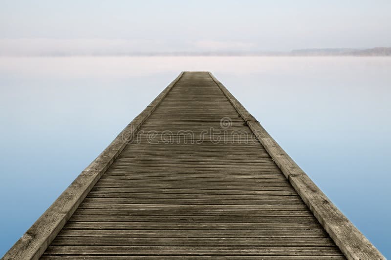 Zen jetty on foggy lake