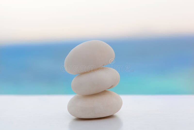 Zen rock stack on tropical beach.