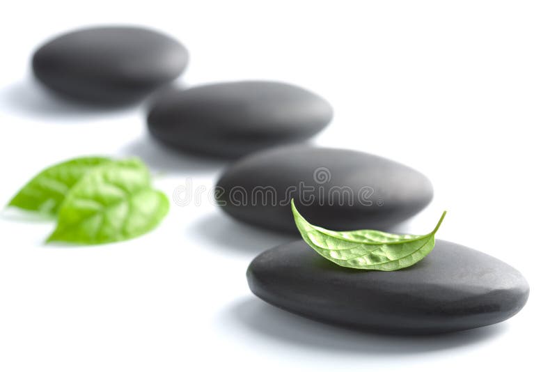 Zen stones with leaves isolated