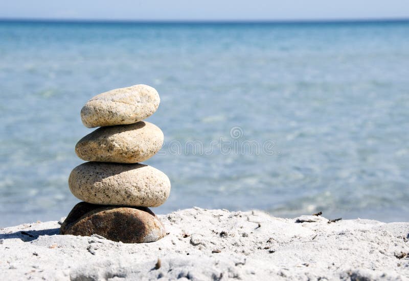 Concept of harmony and balance. Balance stones against the sea. Stock Photo