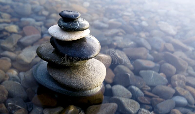 Zen Balancing Rocks Pebbles Covered Water Concept. Zen Balancing Rocks Pebbles Covered Water Concept