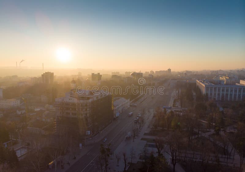 Aerial drone view of Stefan cel mare central boulevard at sunrise in Chisinau with cars, Moldova. Aerial drone view of Stefan cel mare central boulevard at sunrise in Chisinau with cars, Moldova