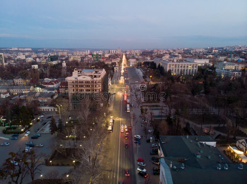 Stefan cel mare central boulevard at sunset in Chisinau with cars, Moldova. Stefan cel mare central boulevard at sunset in Chisinau with cars, Moldova