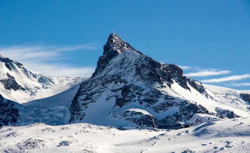 Zermatt small Matterhorn view mountain winter snow landscape Swiss Alps clouds