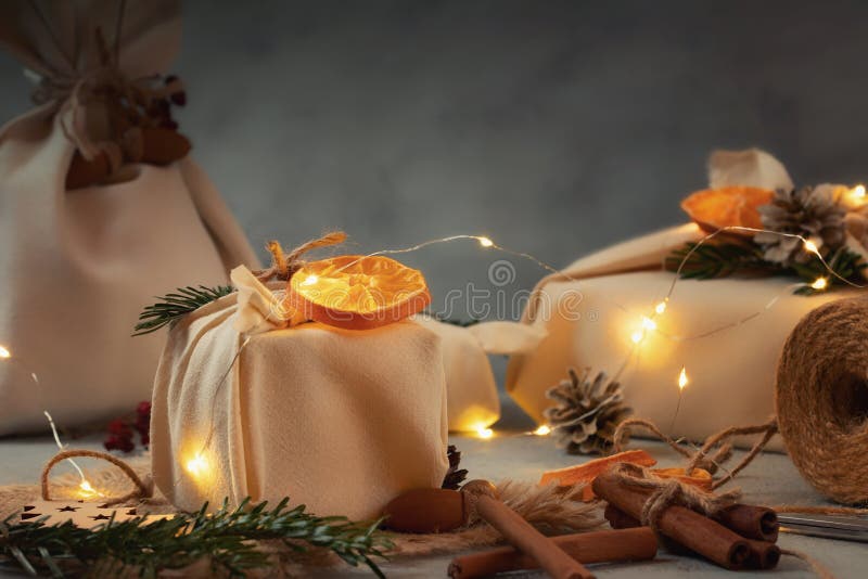Zero Waste Christmas Concept. Packed in Natural Fabric Gifts and