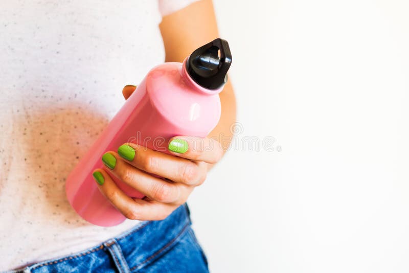 Women stay with Backpack with reusable water bottle in a pocket - a Royalty  Free Stock Photo from Photocase