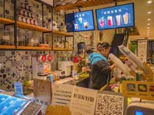 Traditional Chinese Milk Tea Shop And Shop Staff In Zhangjiajie City Traditional Chinese Milk Tea Shop And Shop Staff In Zhangjiajie City