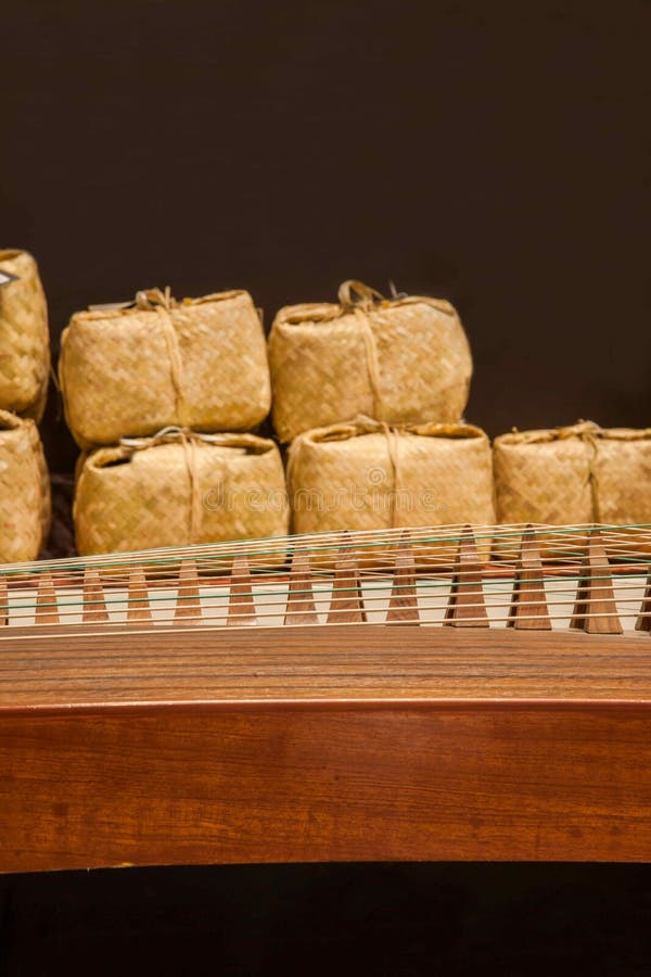 Han Zheng, also known as Zheng, Qin Zheng, Yao Cheng, Luan Cheng, Han Zheng traditional instruments in musical instruments, plucked instruments belong. It is one of China's unique, important national instrument. Tea can meditate, static God, help cultivate character, removal of distractions, which advocated quiet, Tian Tan Oriental philosophy is in tune, also in line with Buddhism and Confucianism spiritual introspection Thought. Inheritance buddhism stock images, royalty-free photos and pictures