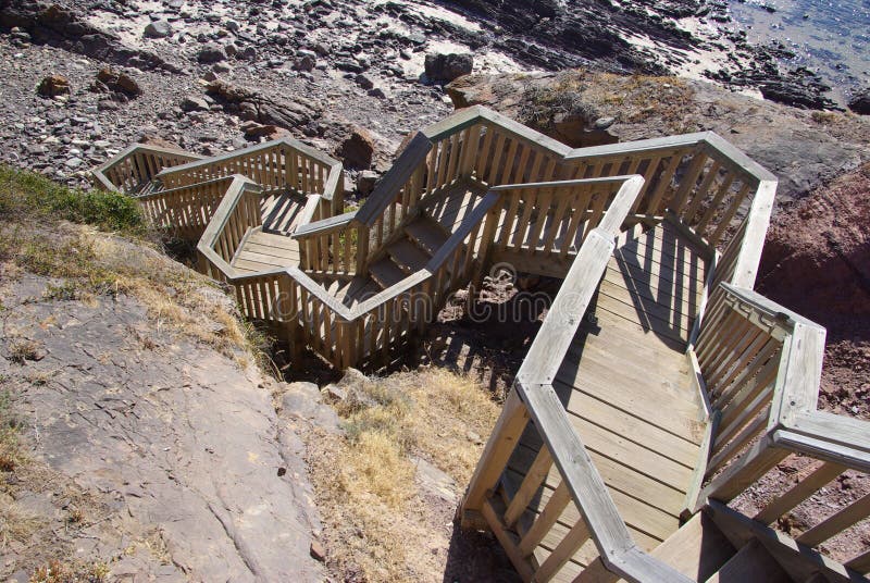Wooden steps zigzagging down to the rocky beach at Hallett Cove. Adelaide, South Australia. Boardwalk rail stock images, royalty-free photos and pictures