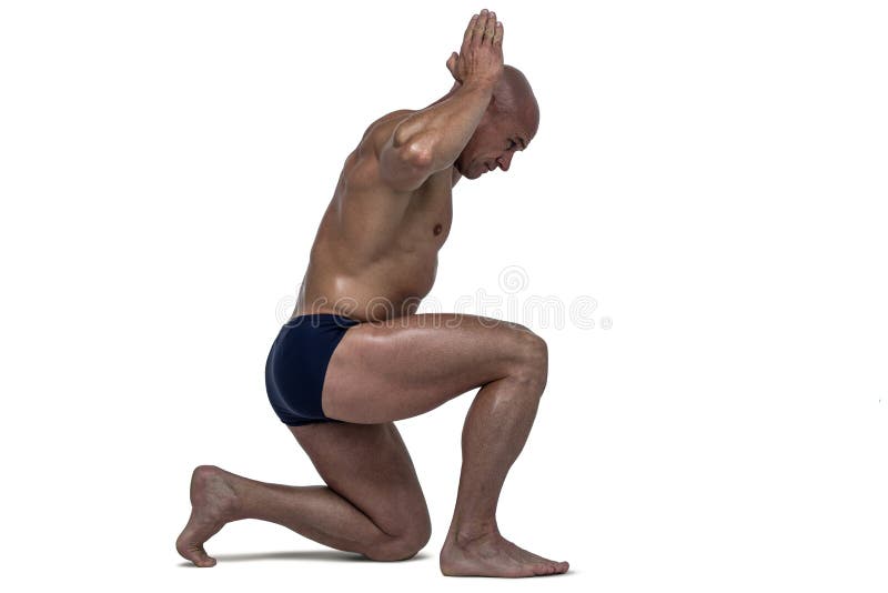 Side view of muscular man exercising against white background. Side view of muscular man exercising against white background