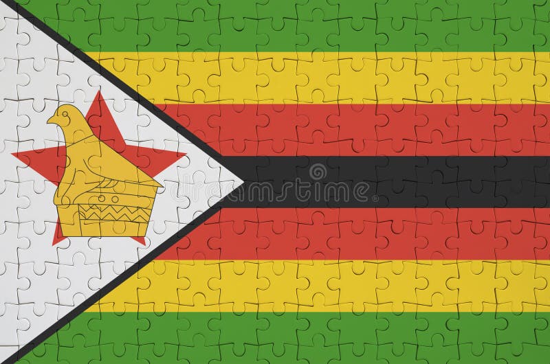 Zimbabwe flaga przedstawia na fałdowej łamigłówce obrazy royalty free