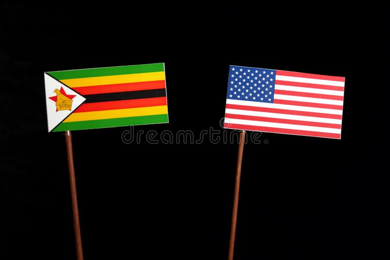 Zimbabwe flaga z usa flaga na czerni obrazy stock