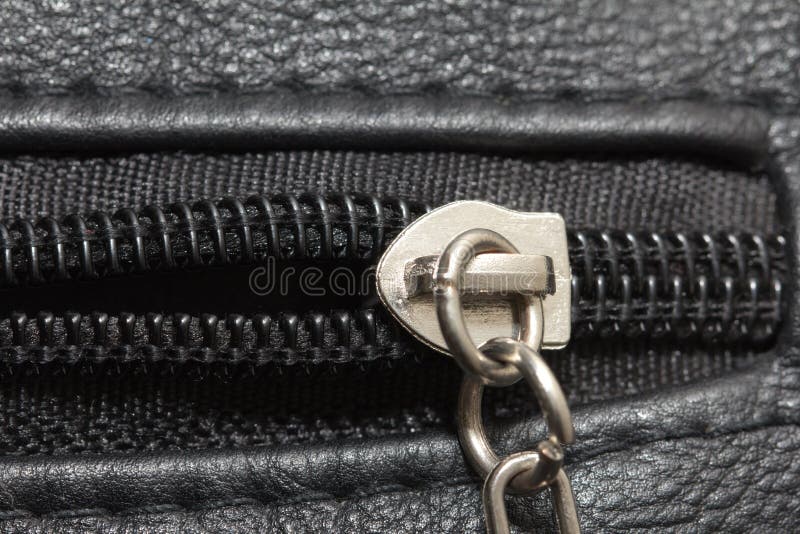 Zipper on black leather stock image. Image of fabric 64426265