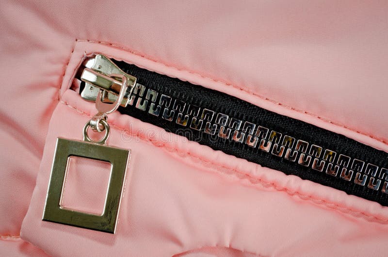 Zipper on the Pocket of the Pink Jacket for Children Stock Photo