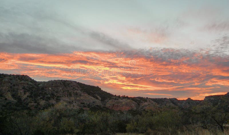 Zmierzch chmurnieje paloduro jar, llano estacado równiny, Texas zdjęcia stock Zmierzch chmurnieje paloduro jar, llano estacado równiny, Texas zdjęcia stock
