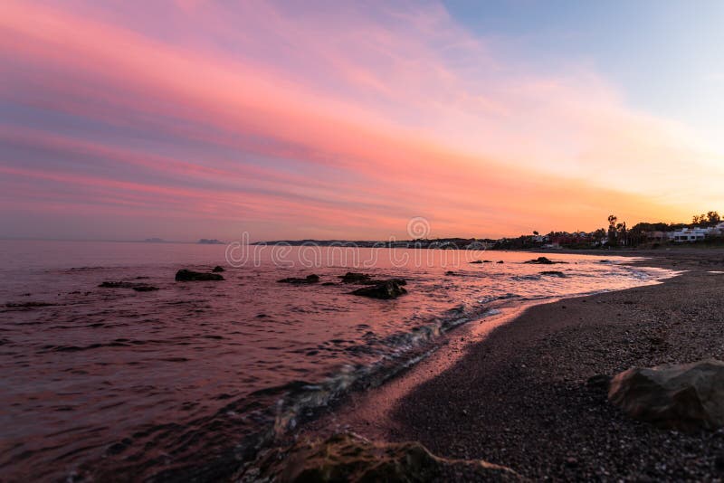 Zmierzch nad plażą, Estepona, Hiszpania zdjęcie stock Zmierzch nad plażą, Estepona, Hiszpania zdjęcie stock