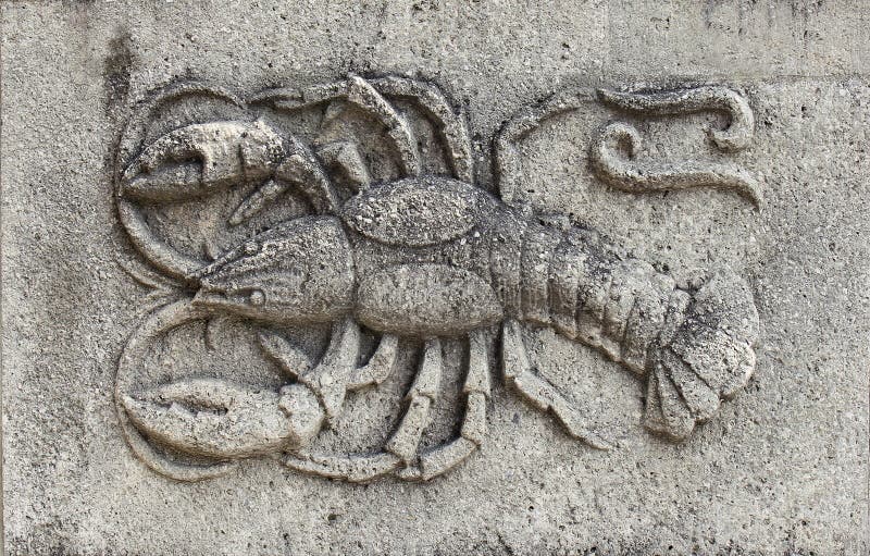 Zodiaco - scorpione, un sollievo di pietra immagine stock Zodiaco - scorpione, un sollievo di pietra immagine stock