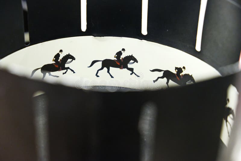 A Zoetrope is Film Animation Devices that Produce the Illusion of Motion by  Displaying Motion of Drawings. Illustrative Photo Editorial Stock Photo -  Image of animation, drum: 110128523