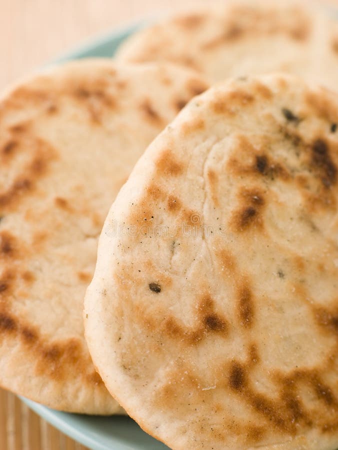Zolla dei pani puri di Naan immagini stock Zolla dei pani puri di Naan immagini stock