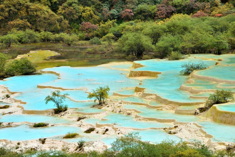 Huanglong is a mountain with natural mineral pools and lakes forming on it. The mineral pools and lakes are very fascinating as they are very colorful and pretty. Huanglong is a mountain with natural mineral pools and lakes forming on it. The mineral pools and lakes are very fascinating as they are very colorful and pretty.