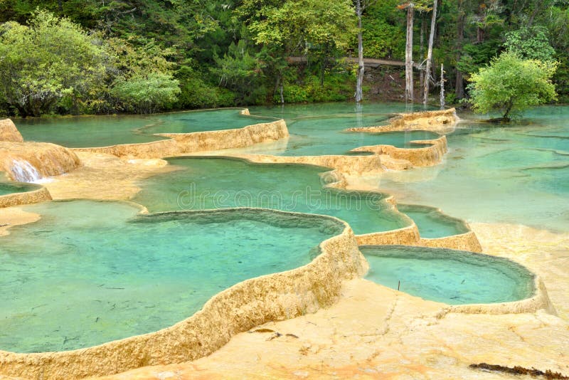 Huanglong is a mountain with natural mineral pools and lakes forming on it. The mineral pools and lakes are very fascinating as they are very colorful and pretty. Huanglong is a mountain with natural mineral pools and lakes forming on it. The mineral pools and lakes are very fascinating as they are very colorful and pretty.