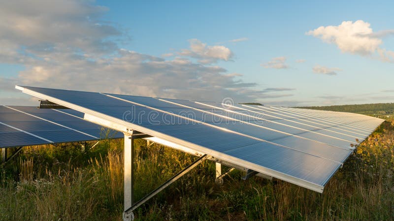 Sun sets on solar energy farm. Sun sets on solar energy farm