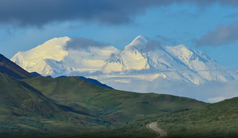 Zoom photo of Mount Denali - mt Mckinley with Denali park road Denali National Park and Preserve, Alaska, United States royalty free stock image Zoom photo of Mount Denali - mt Mckinley with Denali park road Denali National Park and Preserve, Alaska, United States royalty free stock image