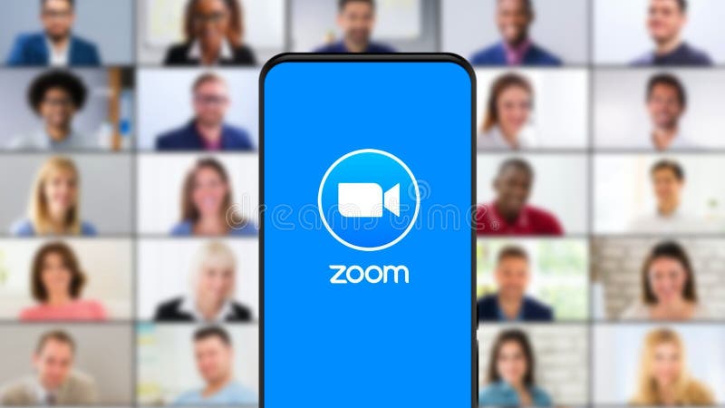 Zoom App Logo on the Screen Smartphone. Preparing for an Online Meeting