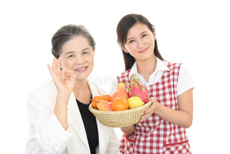 Smiling old women and young woman. Smiling old women and young woman