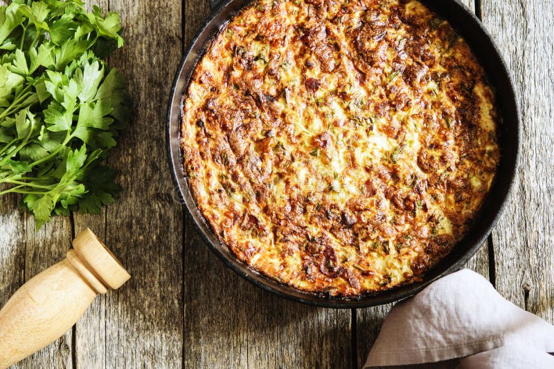 Zucchini Casserole With Bacon And Cheese In Cast Iron Pan Stock Image ...