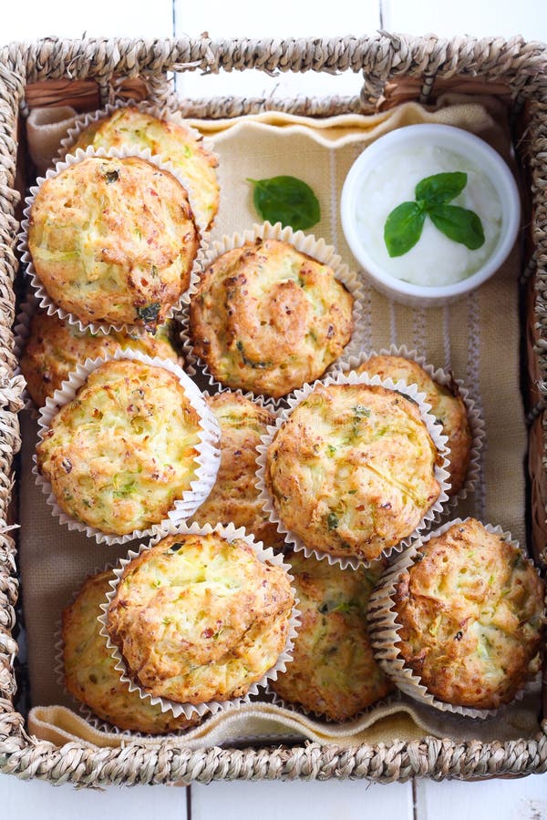 Zucchini, Herbs and Feta Muffins Stock Photo - Image of basket ...