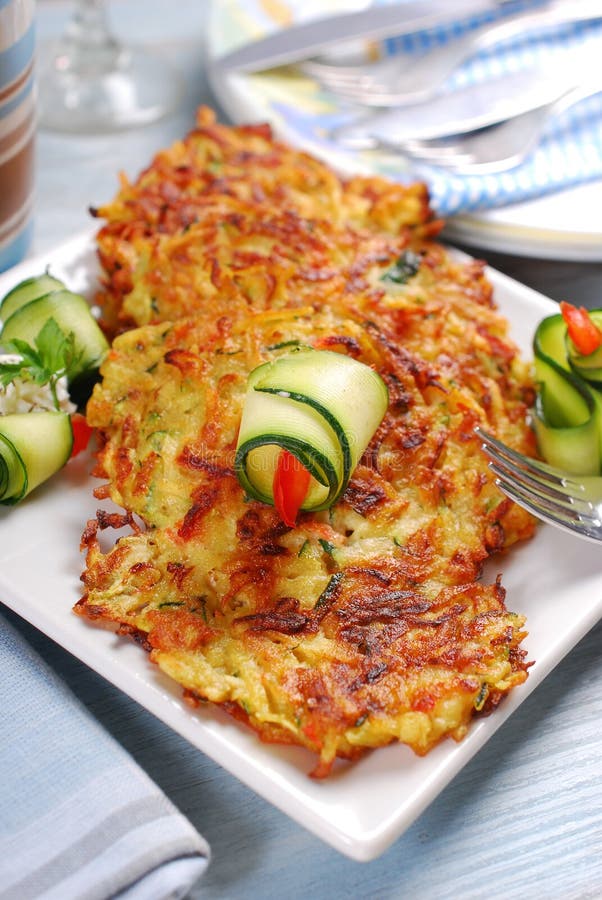 Zucchini and Potato Pancakes Stock Image Image of garnish, blue 63146263
