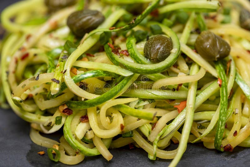 Zucchini Spaghetti with Dehydrated Pepperoni Pepper and Capers Stock