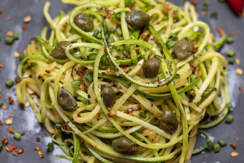 Zucchini Spaghetti with Dehydrated Pepperoni Pepper and Capers Stock