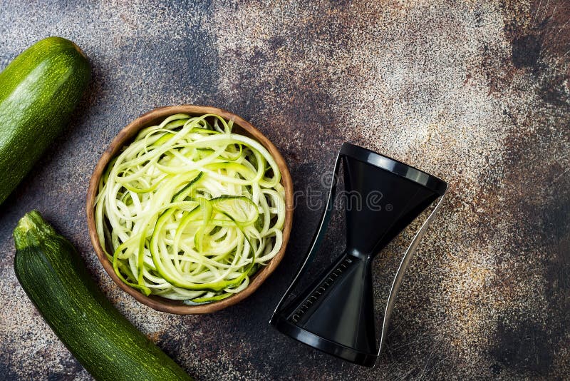Zucchini spaghetti or noodles zoodles bowl. Top view, copy space. royalty free stock images Zucchini spaghetti or noodles zoodles bowl. Top view, copy space. royalty free stock images