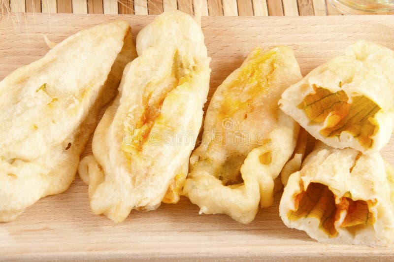 Zucchini with Squash Blossoms and Rice Stock Photo Image of food