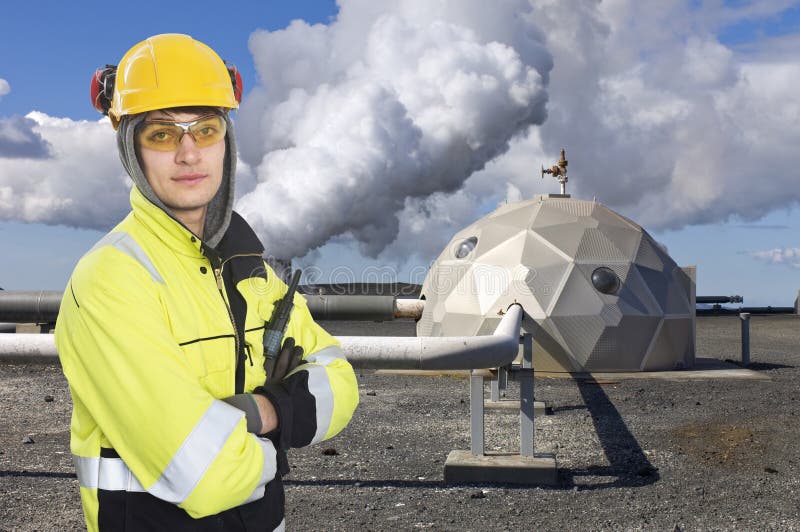 Engineer, wearing all necessary safety gear, standing in front of a futuristic dome, a part of a geothermal and sustainable energy plant in Iceland. Engineer, wearing all necessary safety gear, standing in front of a futuristic dome, a part of a geothermal and sustainable energy plant in Iceland