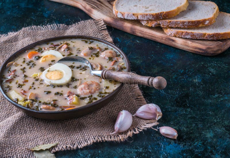 Zurek Polish Easter Soup with Eggs and White Sausage Stock Photo