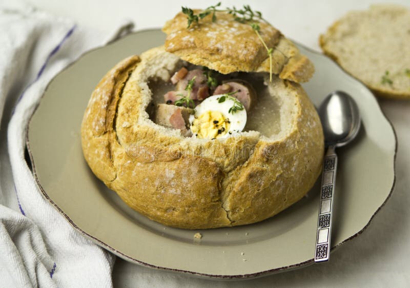 Traditional Zurek. Polish Rye Soup. Sour Bread Soup Served with Hard