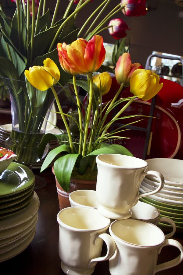 Colorful assortment of dinner plates, cups and bowls in retail store. Colorful assortment of dinner plates, cups and bowls in retail store