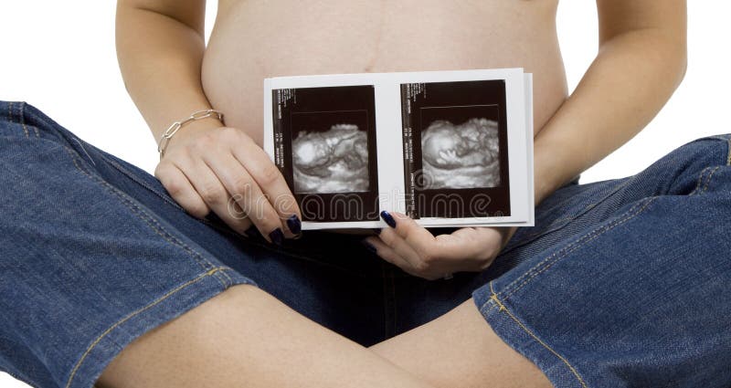 Close up of pregnant woman with sonogram. Close up of pregnant woman with sonogram